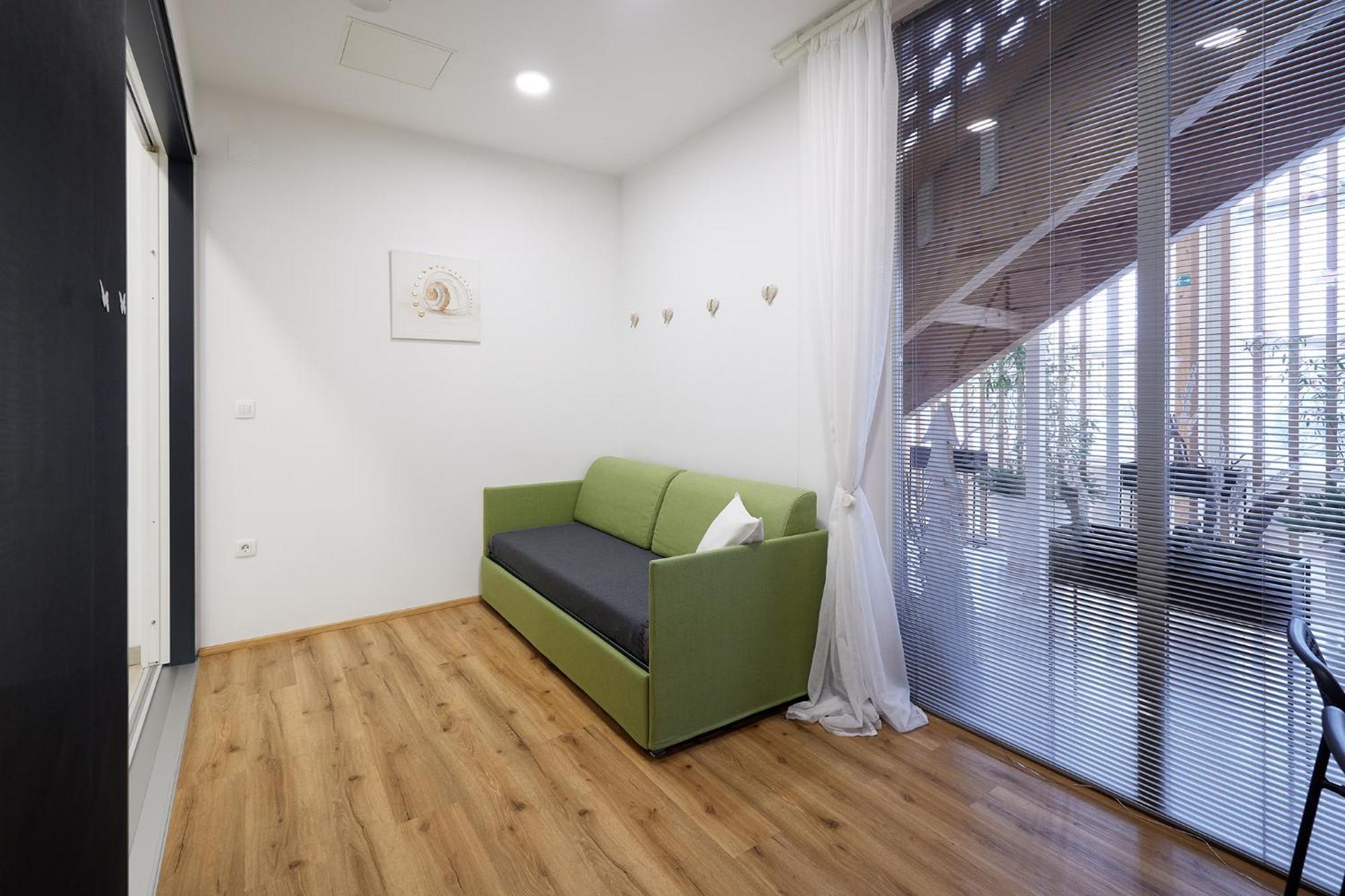 Apartments Smreka كْرانْيِسكا غورا الغرفة الصورة